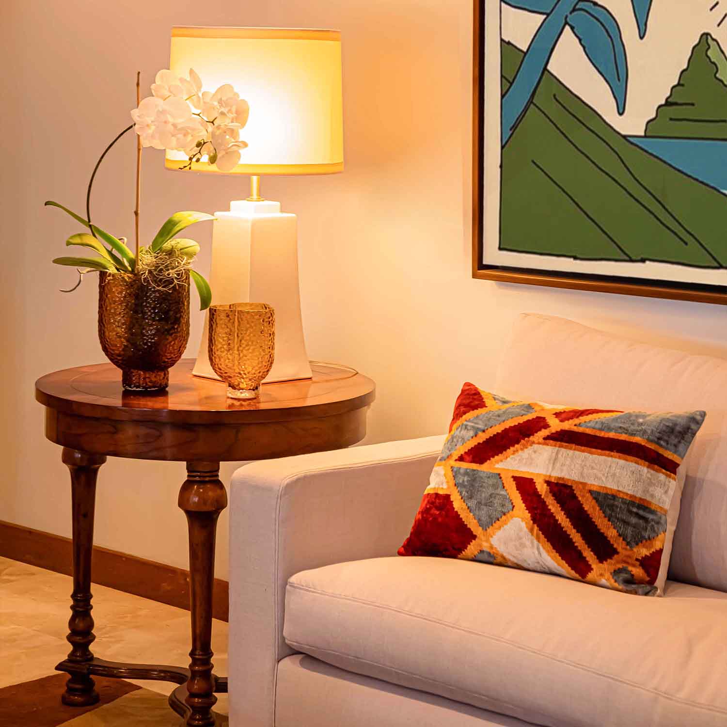 Corner of a living room with a side table as the focal point