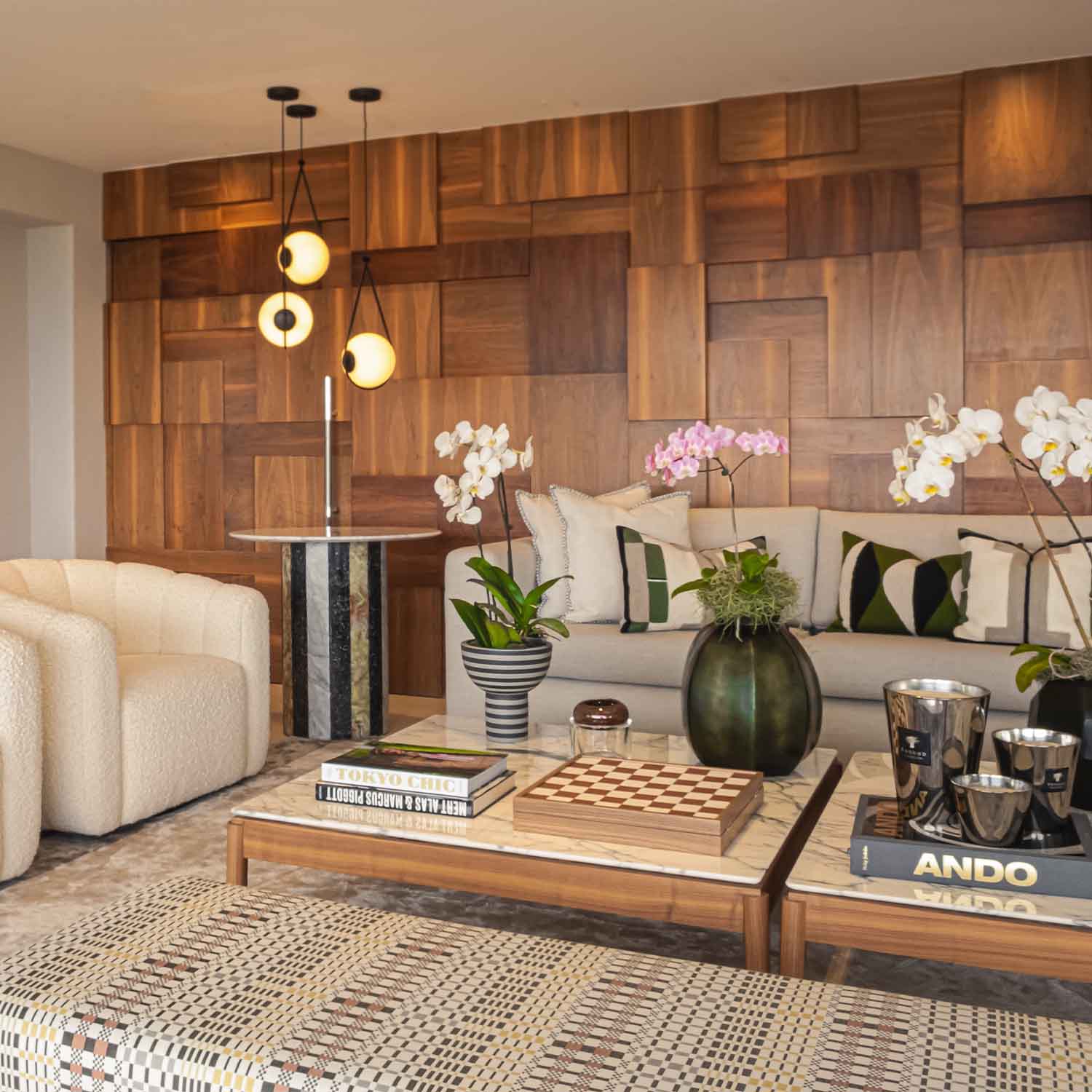 cozy living room with two white couchs and a wooden coffee table